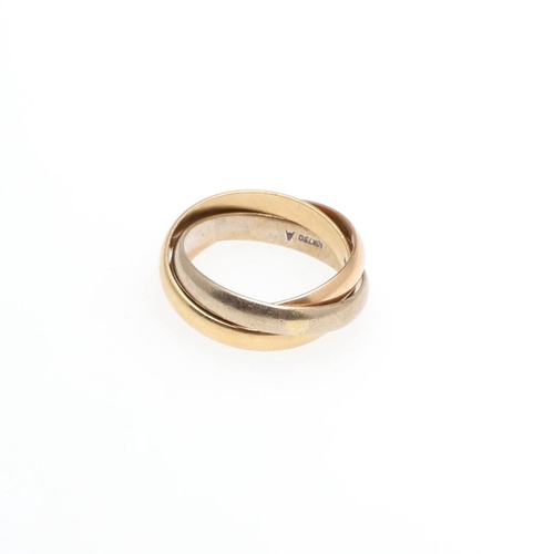 1051 - AN 18CT THREE COLOUR GOLD TRIPLE BAND RING. formed as three interlocking bands, 5.7 grams. Size G.  ... 