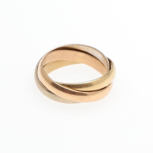 1051 - AN 18CT THREE COLOUR GOLD TRIPLE BAND RING. formed as three interlocking bands, 5.7 grams. Size G.  ... 