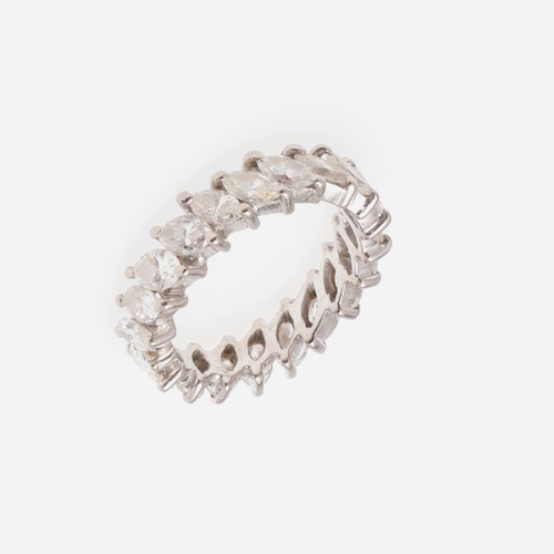 1062 - A DIAMOND FULL CIRCLE ETERNITY RING. mounted with marquise-cut diamonds in white gold, 4.8 grams. Si... 