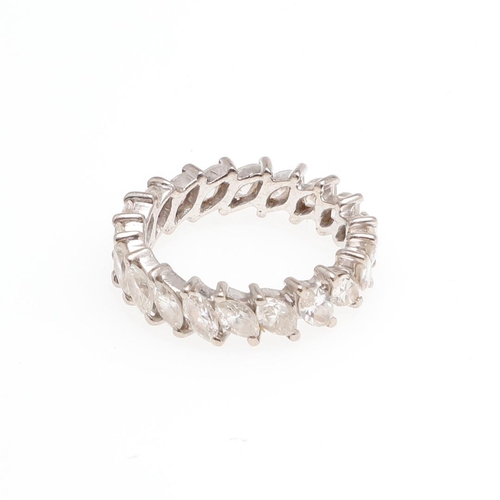 1062 - A DIAMOND FULL CIRCLE ETERNITY RING. mounted with marquise-cut diamonds in white gold, 4.8 grams. Si... 