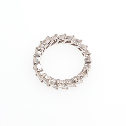 1062 - A DIAMOND FULL CIRCLE ETERNITY RING. mounted with marquise-cut diamonds in white gold, 4.8 grams. Si... 