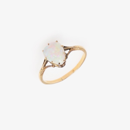 1064 - AN OPAL HEART-SHAPED SINGLE STONE RING. mounted with a heart-shaped solid white opal, in yellow gold... 