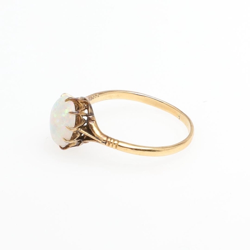 1064 - AN OPAL HEART-SHAPED SINGLE STONE RING. mounted with a heart-shaped solid white opal, in yellow gold... 