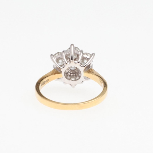 1072 - A DIAMOND CLUSTER RING. mounted with seven brilliant-cut diamonds, weighing 2.00 carats in total, in... 