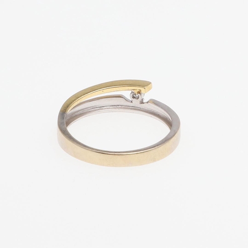 1074 - AN 18CT TWO COLOUR GOLD AND DIAMOND ABSTRACT RING. mounted with a circular-cut diamond, 3.4 grams. S... 