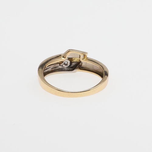 1077 - AN 18CT GOLD AND DIAMOND ABSTRACT RING. set with a circular-cut diamond, 5.2 grams. Size R.  *CR  So... 