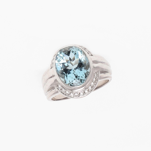 1278 - AN AQUAMARINE AND DIAMOND CLUSTER RING. the oval-shaped aquamarine is set within a surround of circu... 