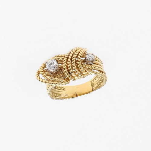 1279 - A DIAMOND AND GOLD RING. of woven gold knotted design, set with two brilliant-cut diamonds, 7.9 gram... 