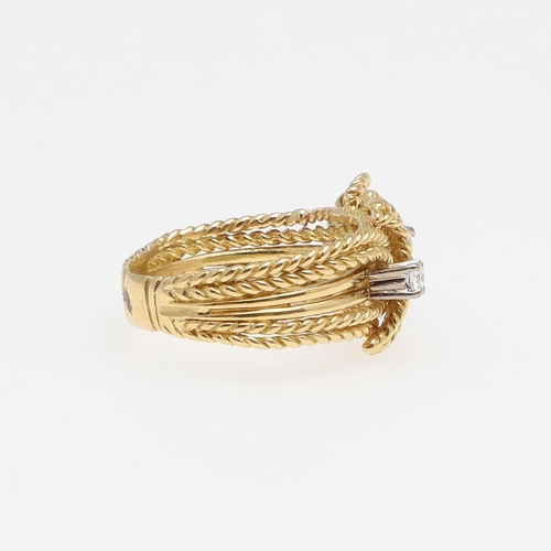 1279 - A DIAMOND AND GOLD RING. of woven gold knotted design, set with two brilliant-cut diamonds, 7.9 gram... 