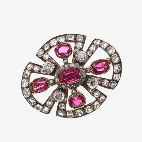 1284 - A VICTORIAN RUBY AND DIAMOND BROOCH PENDANT. mounted with oval-shaped rubies and overall with gradua... 