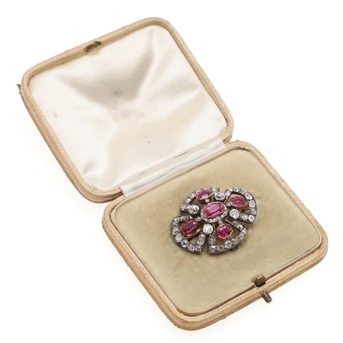 1284 - A VICTORIAN RUBY AND DIAMOND BROOCH PENDANT. mounted with oval-shaped rubies and overall with gradua... 