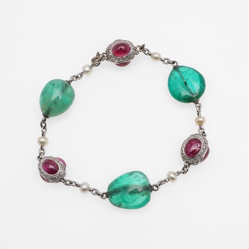 1288 - AN EMERALD, RUBY AND DIAMOND BRACELET. formed with three emerald beads, and three diamond set oval s... 