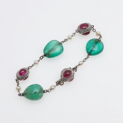 1288 - AN EMERALD, RUBY AND DIAMOND BRACELET. formed with three emerald beads, and three diamond set oval s... 