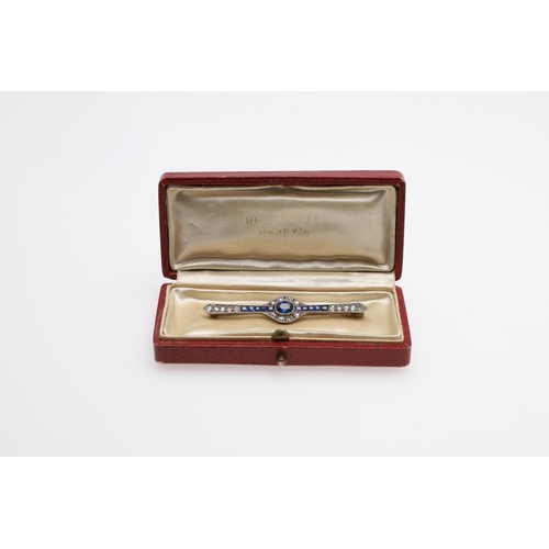 1291 - AN ART DECO SAPPHIRE AND DIAMOND BROOCH. the oval-shaped sapphire is set within a surround of circul... 