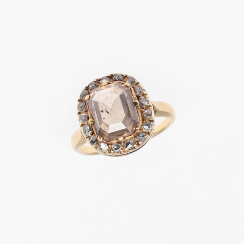 1296 - A 19TH CENTURY NATURAL FANCY BROWN DIAMOND CLUSTER RING. the octagonal-shaped fancy brown diamond we... 