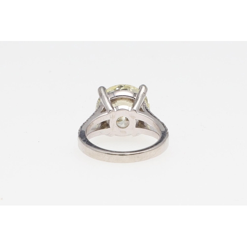 1310 - A DIAMOND SOLITAIRE RING. mounted with a brilliant-cut diamond weighing 6.20 carats, with circular-c... 