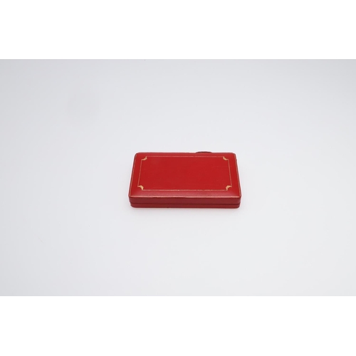 898 - A RED LEATHER JEWELLERY BOX BY CARTIER. with gold decoration, 16.5 x 9.8cm.  *CR  With some wear.