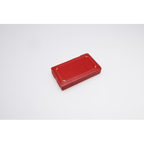 898 - A RED LEATHER JEWELLERY BOX BY CARTIER. with gold decoration, 16.5 x 9.8cm.  *CR  With some wear.