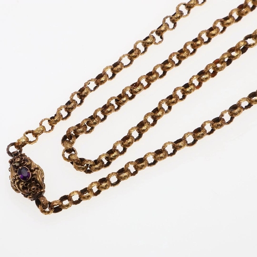 932 - A VICTORIAN GOLD MUFF CHAIN. formed with circular links with embossed decoration to a gold foliate c... 