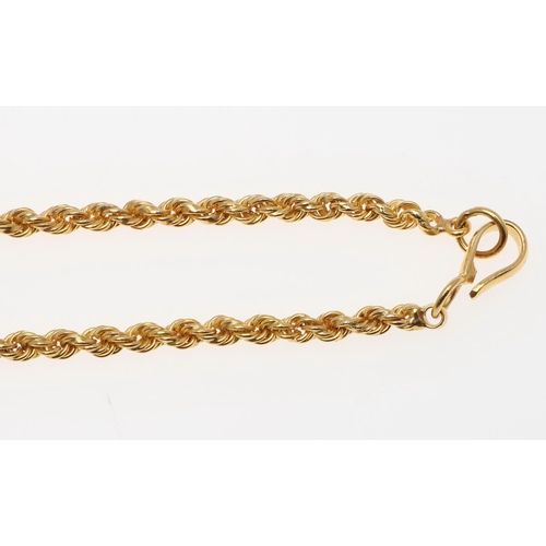 935 - A GOLD ROPE LINK NECKLACE. with a hook clasp, 45.5cm long, 23.3 grams, together with a conforming br... 