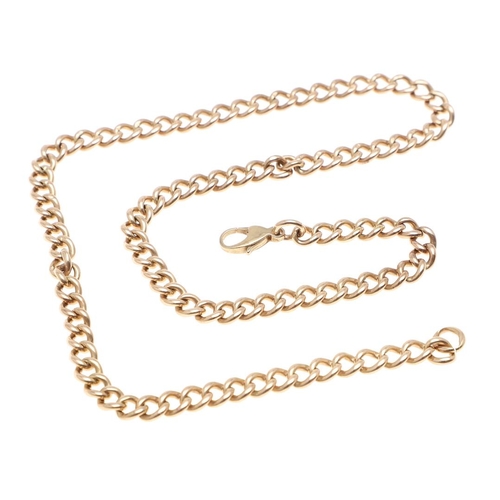 938 - A 9CT GOLD CURB LINK WATCH CHAIN. 40cm long, 23.9 grams, suspending a gold spinning fob mounted with... 