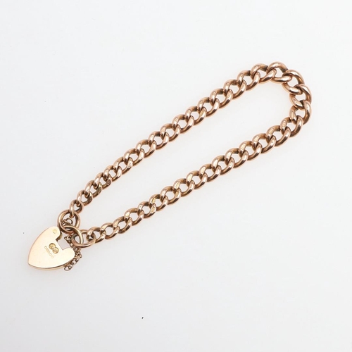 941 - A 9CT GOLD CURB LINK BRACELET. with padlock clasp, each link stamped 9 375, 19cm long, 21.0 grams.  ... 