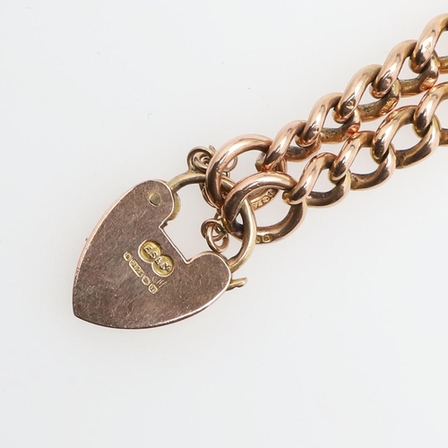 941 - A 9CT GOLD CURB LINK BRACELET. with padlock clasp, each link stamped 9 375, 19cm long, 21.0 grams.  ... 