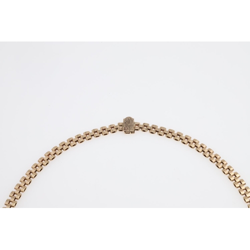 945 - A 9CT THREE COLOUR GOLD FRINGE NECKLACE. formed with graduated three gold textured baton drops, 48cm... 