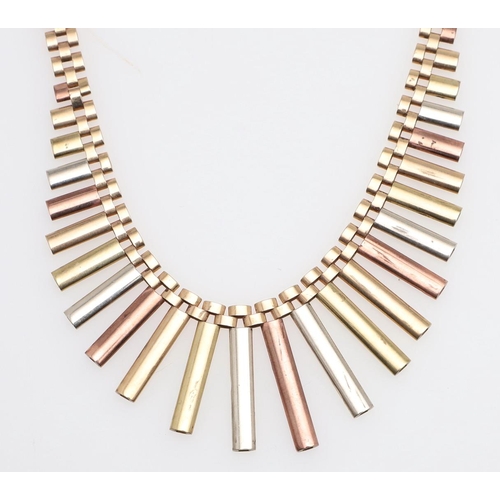 945 - A 9CT THREE COLOUR GOLD FRINGE NECKLACE. formed with graduated three gold textured baton drops, 48cm... 