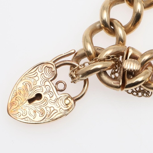 948 - A 9CT GOLD CURB LINK BRACELET. with foliate engraved padlock clasp, 19cm long, 60.5 grams.  *CR  Som... 