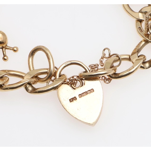 949 - A 9CT GOLD CURB LINK BRACELET. each link stamped 9 375, with padlock clasp and suspending assorted 9... 