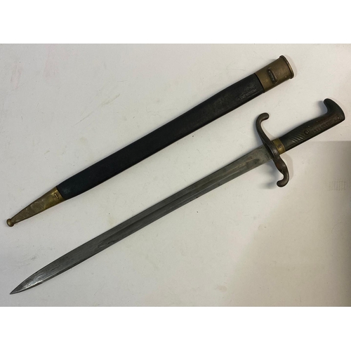 109 - A BAVARIAN M.1871 SWORD BAYONET AND SCABBARD. A Bavarian M.1871 Sword Bayonet with a 47cm pointed an... 