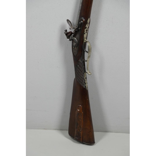 11 - A 24 BORE FLINTLOCK RIFLE BY EVANS OF CARMARTHEN. With a heavy 70.5cm octagonal barrel with folding ... 