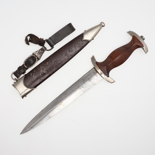 116 - A SECOND WORLD WAR GERMAN SA DAGGER AND SCABBARD. With a 22cm pointed, double edged blade inscribed ... 