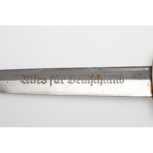 116 - A SECOND WORLD WAR GERMAN SA DAGGER AND SCABBARD. With a 22cm pointed, double edged blade inscribed ... 