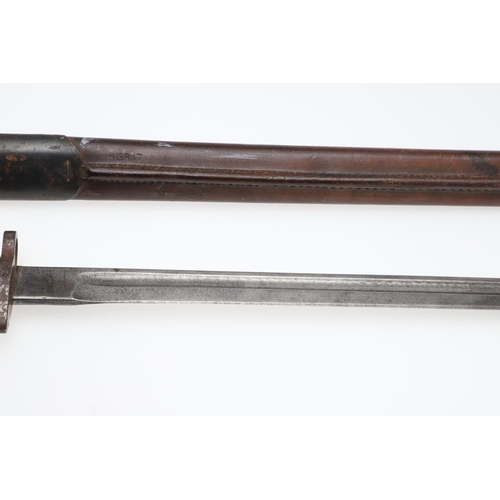 117 - A FIRST WORLD WAR 1907 PATTERN BAYONET AND SCABBARD. With a 43cm single edged fullered blade, the ri... 