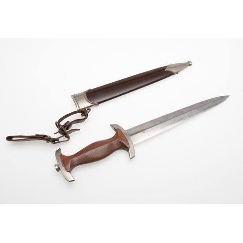 119 - A SECOND WORLD WAR GERMAN SA DAGGER AND SCABBARD. With a 22cm double sided blade marked 'Alles Fur D... 