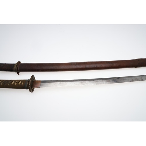 121 - A JAPANESE KATANA IN LACQUERED SCABBARD. MID 20TH CENTURY. A Second World War Japanese Officers Swor... 