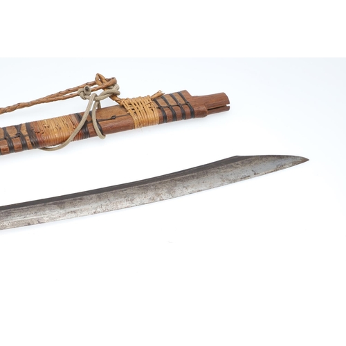 127 - A BORNEO DYACK SWORD AND SCABBARD AND A SIMILAR KNIFE AND SHEATH. A Dyack 'Headhunters' sword with a... 