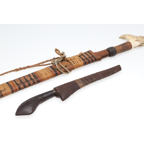 127 - A BORNEO DYACK SWORD AND SCABBARD AND A SIMILAR KNIFE AND SHEATH. A Dyack 'Headhunters' sword with a... 