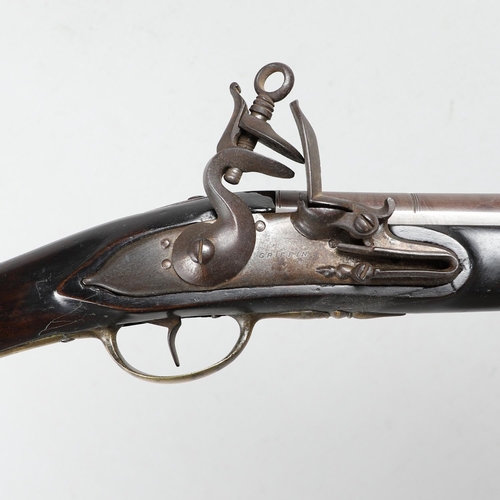 13 - A FLINTLOCK MUSKETOON BY GRIFFIN OF LONDON. A Musketoon with a 76cm flared barrel marked with a star... 