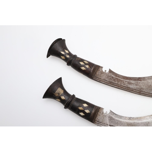 130 - TWO LATE 19TH OR EARLY 20TH CENTURY KUKRI, ONE WITH SCABBARD. A Kukri with traditional 35cm shaped b... 