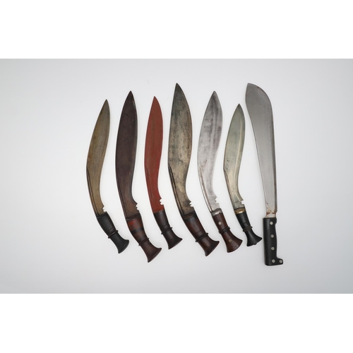 132 - A COLLECTION OF KUKRI KNIVES. A Military issue Kukri knife with traditionally shaped 34cm blade with... 