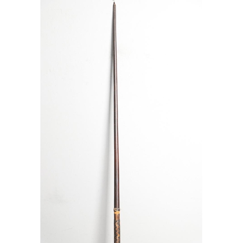 149 - AN AFRICAN LONG BOW. A flat fronted long bow with raffia wound grip, probably African late 19th or e... 