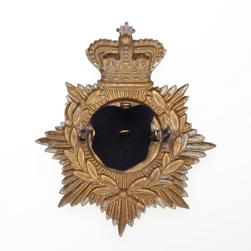 156 - A VICTORIAN KING'S LIVERPOOL REGIMENT HELMET PLATE. A Liverpool Regiment Helmet plate c.1889-1901, s... 