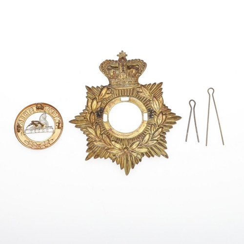 159 - A VICTORIAN LINCOLNSHIRE REGIMENT HELMET PLATE. A Lincolnshire Regiment Helmet plate c.1889-1901, st... 