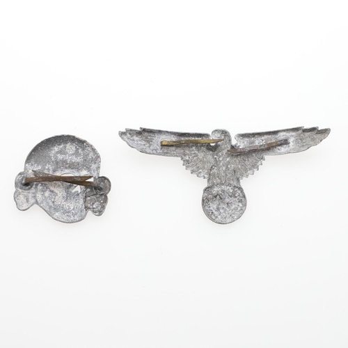 165 - A SET OF SECOND WORLD WAR GERMAN SS CAP INSIGNIA. A cap insignia set comprising zinc eagle and secon... 