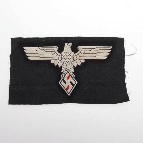 175 - A NSDAP STUDENT'S ASSOCIATION SPORTS SHIRT BADGE. A PT shirt breast eagle, large BeVo weave with the... 