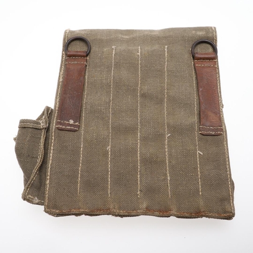 176 - A SECOND WORLD WAR GERMAN AMMUNITION POUCH. A German ammunition pouch for six sub-machine gun magazi... 