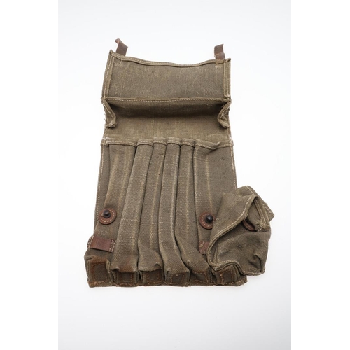 176 - A SECOND WORLD WAR GERMAN AMMUNITION POUCH. A German ammunition pouch for six sub-machine gun magazi... 